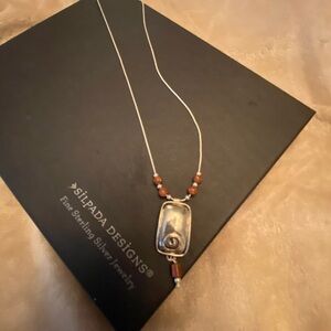 Silpada sterling silver necklace with sandstone accents.